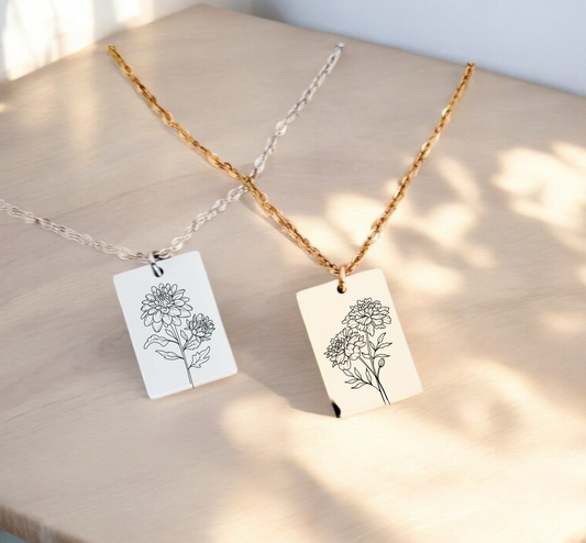Gold personalized birth flower necklace showing square pendant design