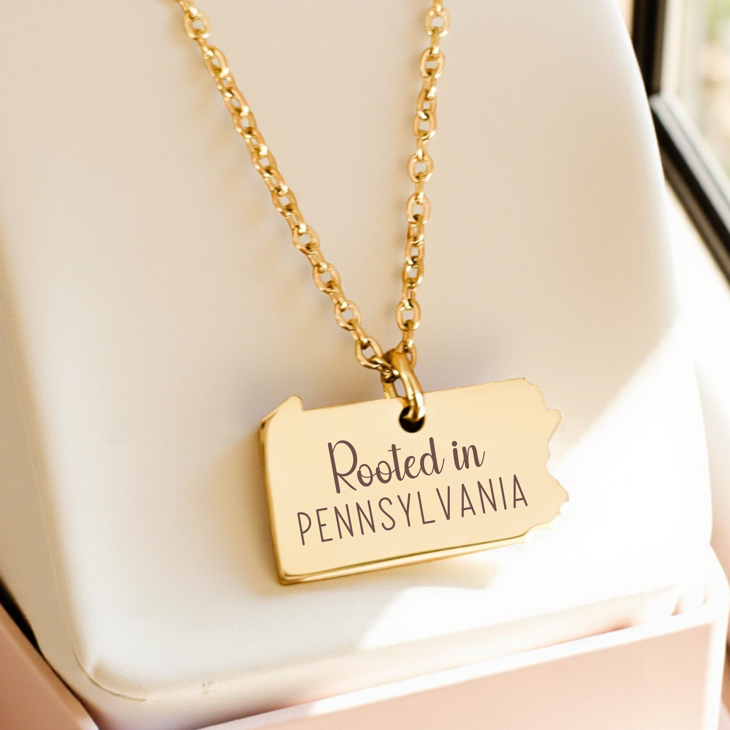 Dainty Pennsylvania outline pendant in gold with polished finish
