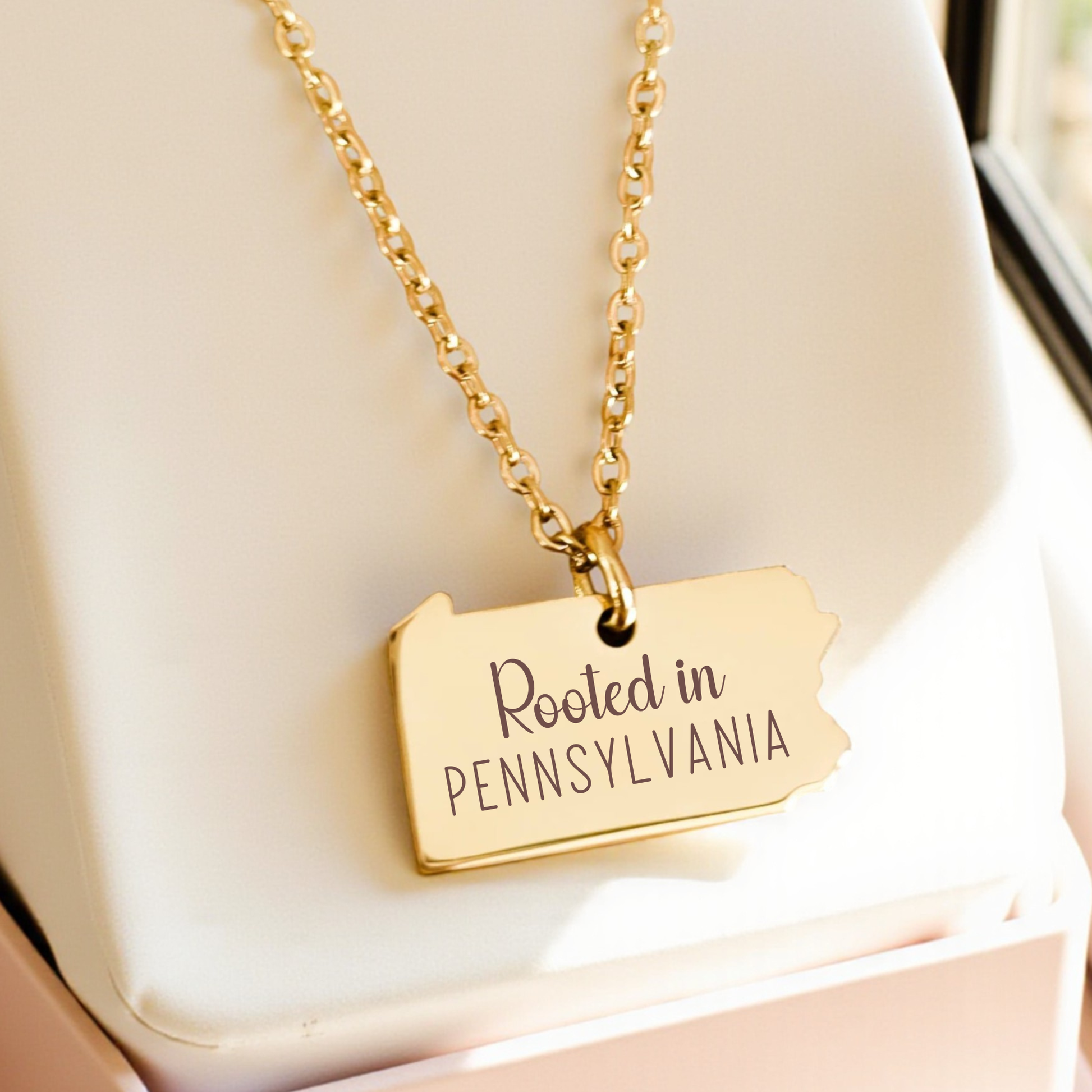 Dainty Pennsylvania outline pendant in gold with polished finish